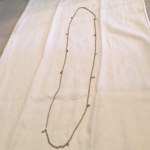 Long gold necklace